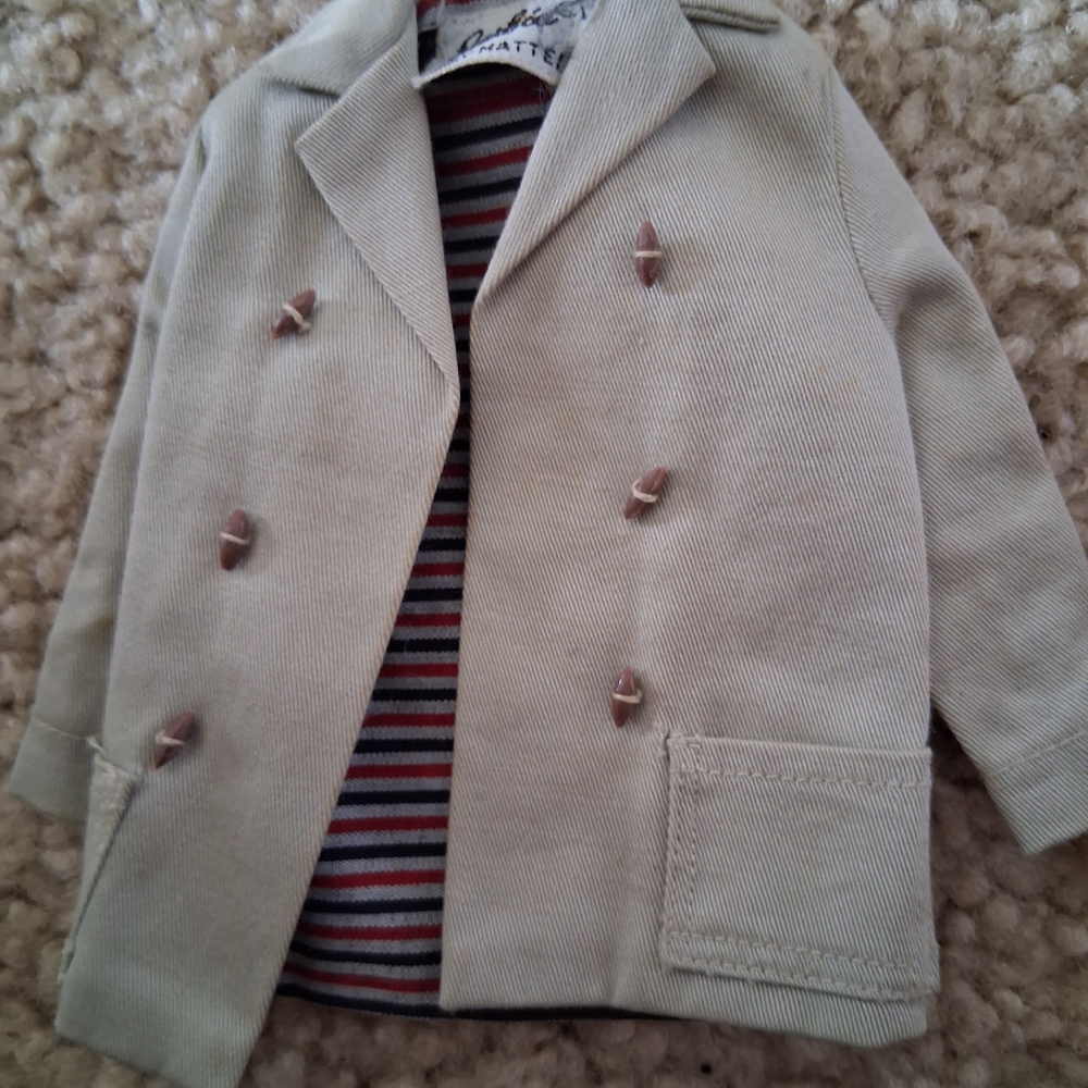 Vintage Barbie beige coat. Lined with pinstripe fabric.